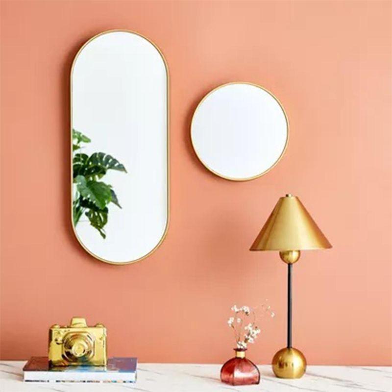 A set of longitudinal and round wall mirrors with a frame - two pieces - gold - By Family Ship - ALHOME